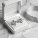 The Silver Crest Studs
