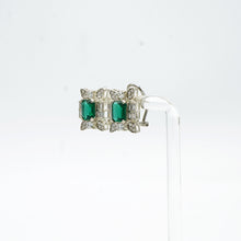 The Enclosed Emerald Stud Earrings
