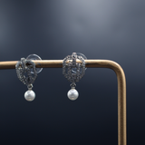 The Drawstring Pearl Drop Earrings